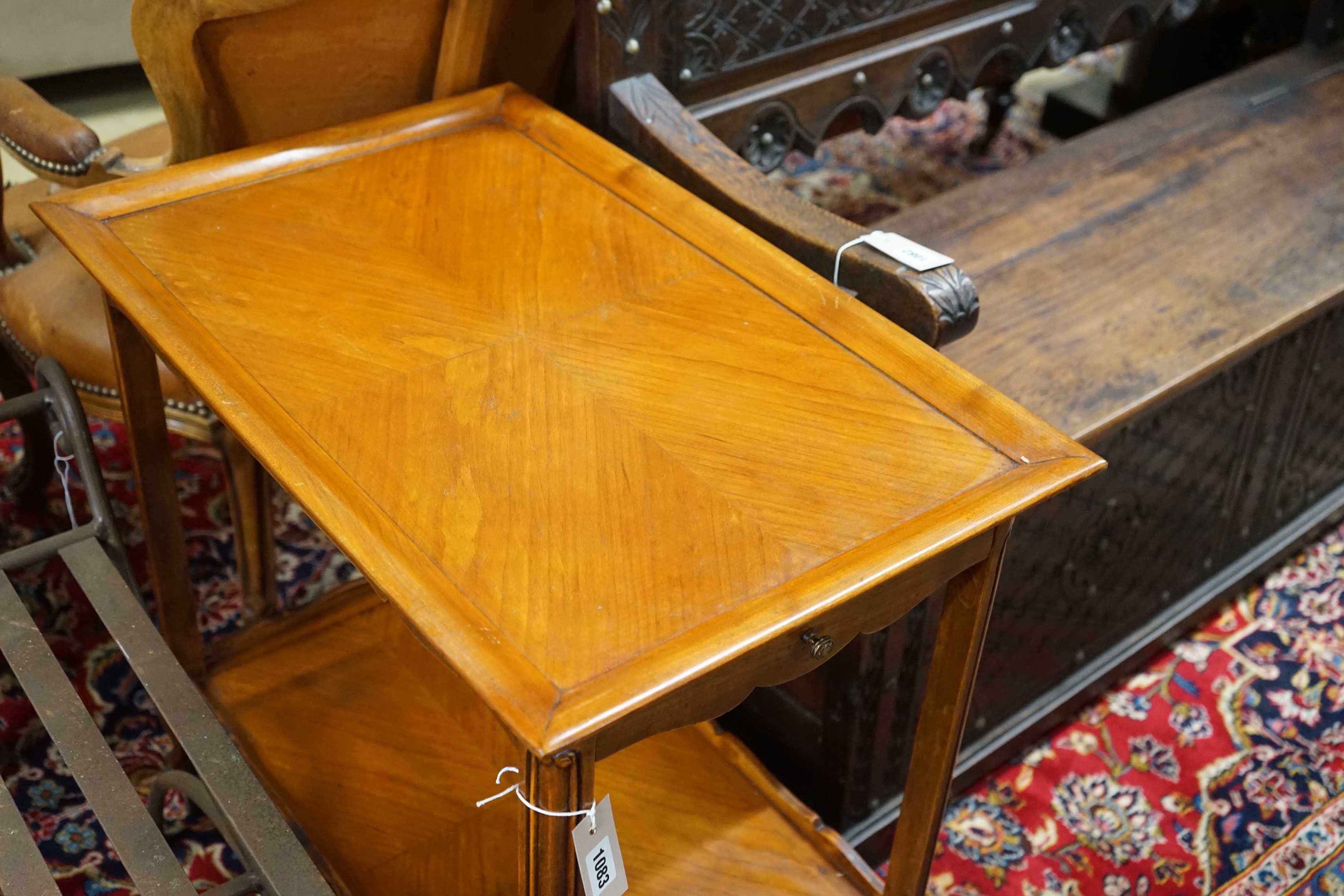A French reproduction rectangular two tier tea trolley, width 69cm, depth 44cm, height 69cm together with a G Plan teak coffee table